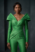 Close-up front view of the solid grass green couture jumpsuit