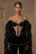 Front close-up of the black-and-gold couture jumpsuit without necklace
